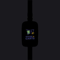 A black luggage tag with a strap, featuring a printed logo for 'House 10 Carts' in purple, yellow, and green on a solid white background.