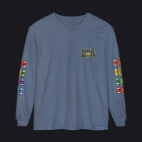 A slate blue long-sleeve t-shirt with a 'HOC SLOTS' graphic on the left chest and colorful slot machine graphics printed down both sleeves, shown against a plain white background.
