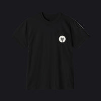 Black t-shirt with a small green logo on a gray background