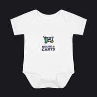 A white short-sleeve baby bodysuit with a graphic on the chest showing a green and yellow shopping cart and the text 'HOUSE OF CARTS' in navy blue, displayed on a clean white background.