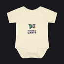 A cream-colored short-sleeve baby bodysuit with a 'HOUSE OF CARTS' graphic printed on the chest, displayed against a solid white background.