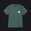 A dark teal green short-sleeve crewneck pocket t-shirt with a small circular chest graphic, displayed flat against a solid white background.