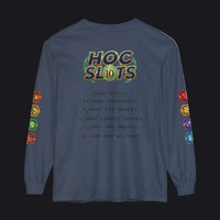 A navy blue long-sleeve t-shirt shown from the back, featuring a large 'HOC SLOTS 10' graphic with gold, green, and orange accents, and various colorful hexagonal game-themed icons printed down both sleeves.