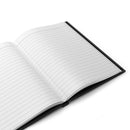 Open notebook with lined pages on a white background
