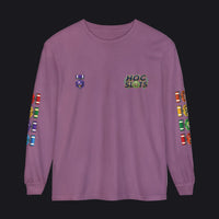A long-sleeve crewneck t-shirt in dusty purple, featuring a 'HOC SLOTS' graphic on the left chest, a small emblem on the right chest, and colorful military-style insignia printed down both sleeves.