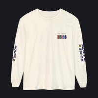 An off-white long-sleeve t-shirt with a small multicolor chest graphic reading 'MVC 51 R179' with military-style ribbons, and 'HOUSE CARDS' printed vertically in navy blue with a gold crown logo on both sleeves.