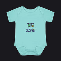 A light aqua baby bodysuit with a 'HOUSE OF CARTS' graphic printed on the chest, displayed flat against a solid white background.