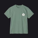 A sage green short-sleeve crewneck pocket t-shirt with a small white circular graphic on the chest pocket depicting a power plug.