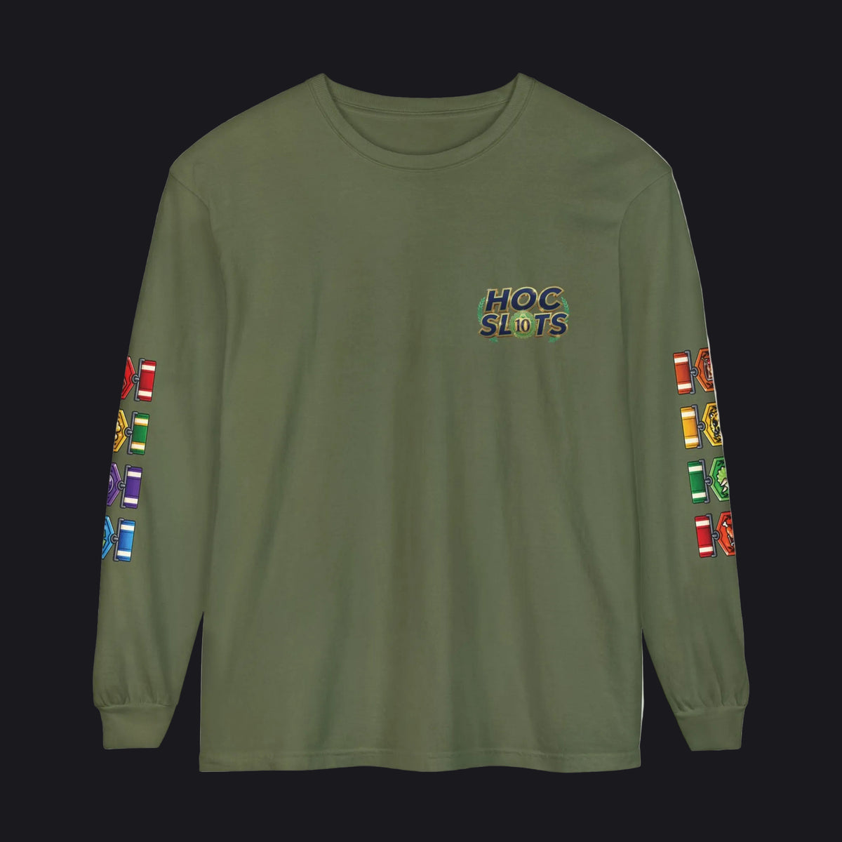 An olive green long-sleeve t-shirt with a colorful 'HOC SLOTS' graphic on the left chest and matching multicolor graphics on both sleeves, displayed against a solid white background.