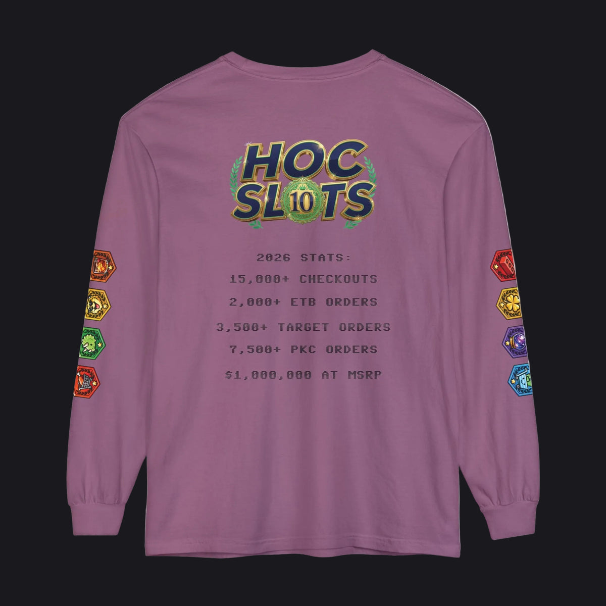 A purple long-sleeve t-shirt with a gaming-themed graphic on the back. The graphic features a 'HOC SLOTS 10' logo in a green and gold gradient, followed by dark gray text displaying various gaming statistics (checkouts, ETD orders, target orders, PKC orders, and a $1,000,000 at MSRP).
