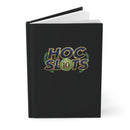 Black notebook with a white symbol on a white background