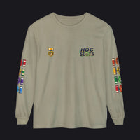 A long-sleeve crewneck t-shirt in khaki beige, featuring a 'HOC SLOTS' graphic on the left chest, a small gold emblem on the right chest, and colorful military-style ribbons printed down both sleeves.