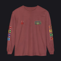 A long-sleeve crewneck t-shirt in a dusty rose or mauve color, featuring a 'HOC SLOTS' graphic on the left chest, a small red and white flag graphic on the right chest, and colorful flag graphics printed down both sleeves.
