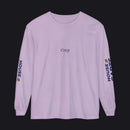 A light purple long-sleeve t-shirt with 'tlrep' printed in black on the chest and 'HOUSE CARDS' in navy with a yellow crown logo on both sleeves, shown on a plain white background.