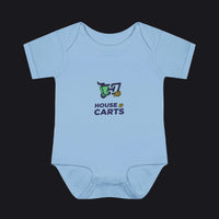 A light blue short-sleeve baby bodysuit with a 'HOUSE OF CARTS' graphic printed on the chest, displayed flat against a solid white background.