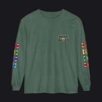 A dark green long-sleeve t-shirt with 'HOC SLOTS' printed on the left chest in a colorful gradient font. The sleeves feature vertical columns of colorful flag-like graphics on both sides.