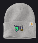 A light gray heather knit beanie hat with a folded cuff, featuring a colorful embroidered graphic on the front and a white Carhartt brand patch on the side.