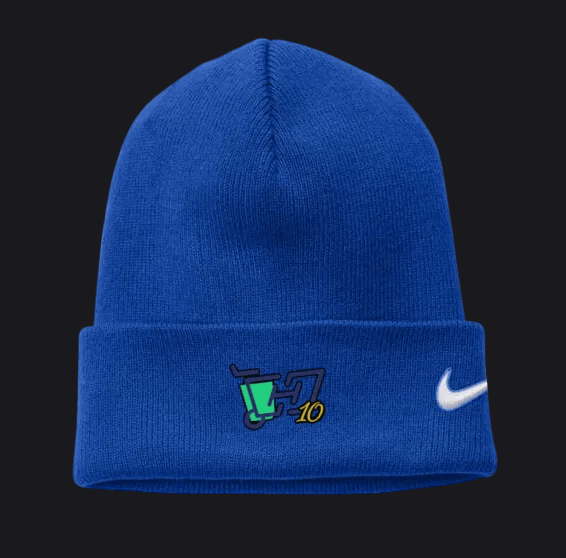 A royal blue knit beanie hat featuring a white Nike swoosh on the cuff and a custom embroidered graphic on the front with a green cup, dark blue '17', and yellow '10'.
