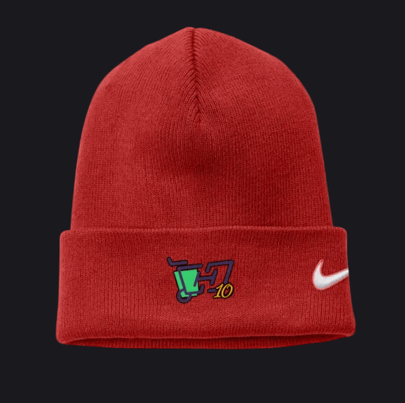 A red knit beanie hat featuring a white Nike swoosh on the cuff and a colorful embroidered Utah Jazz logo with '10' on the front.