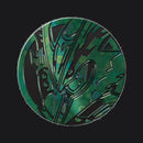 The green Mega Rayquaza collector's coin included in the Delta Reign Elite Trainer Box.