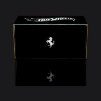 Plain black outer shipping box, Hot Wheels logo on the lid and a prancing horse on the side.